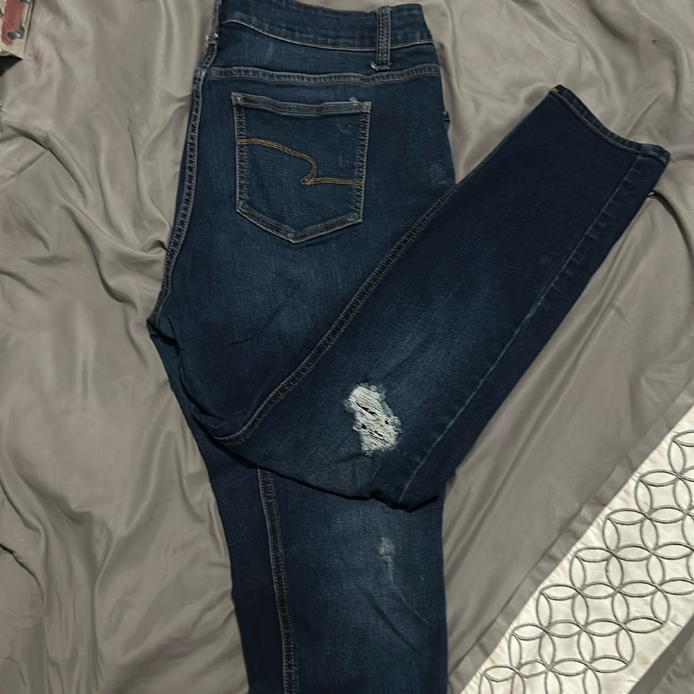 Distress skinny jeans